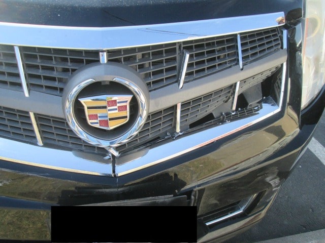 Cadillac XTS before front grill damage auto body by Barbosa's Kustom Kolor, Kansas City, MO