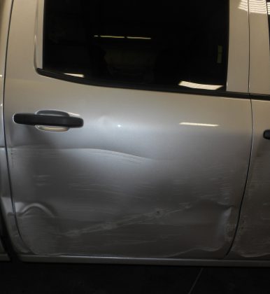 Scratch and Dent Repair from best auto body repair and paint shop in Parkville and the Northand, Barbosa's Kustom Kolor.